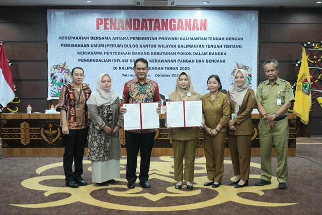 Asisten Ekbang Sri Widanarni Lakukan Penandatanganan Kesepakatan Bersama antara Pemprov Kalteng dengan Perusahaan Umum Bulog Kantor Wilayah Kalteng