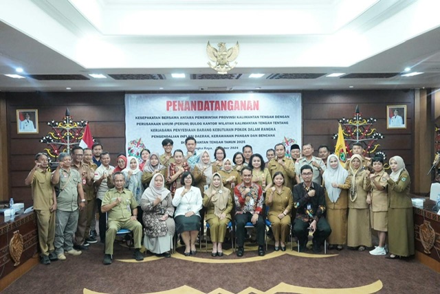 Asisten Ekbang Sri Widanarni Lakukan Penandatanganan Kesepakatan Bersama antara Pemprov Kalteng dengan Perusahaan Umum Bulog Kantor Wilayah Kalteng